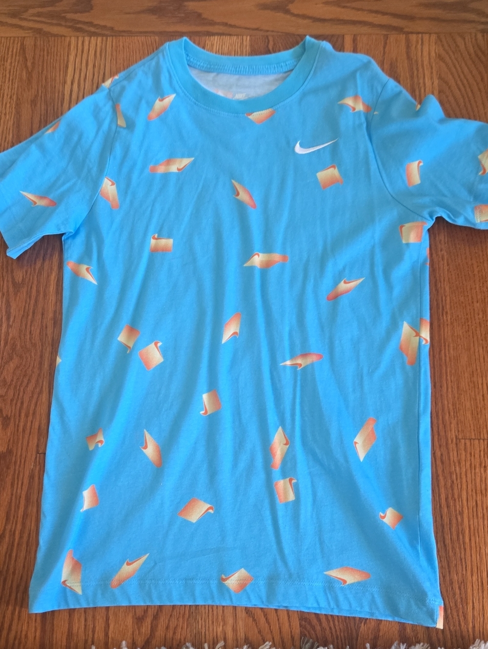 Nike Turquoise Tee with Orange Accent Graphics